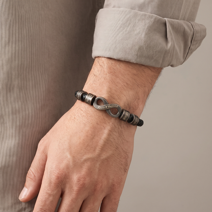 Men's infinity name bracelet worn on wrist