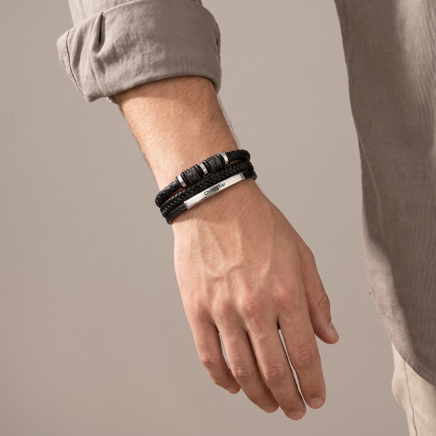Son's triple stack bracelet worn on wrist