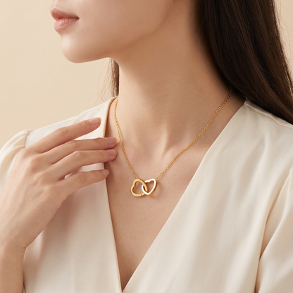 Interlocking hearts necklace worn side view